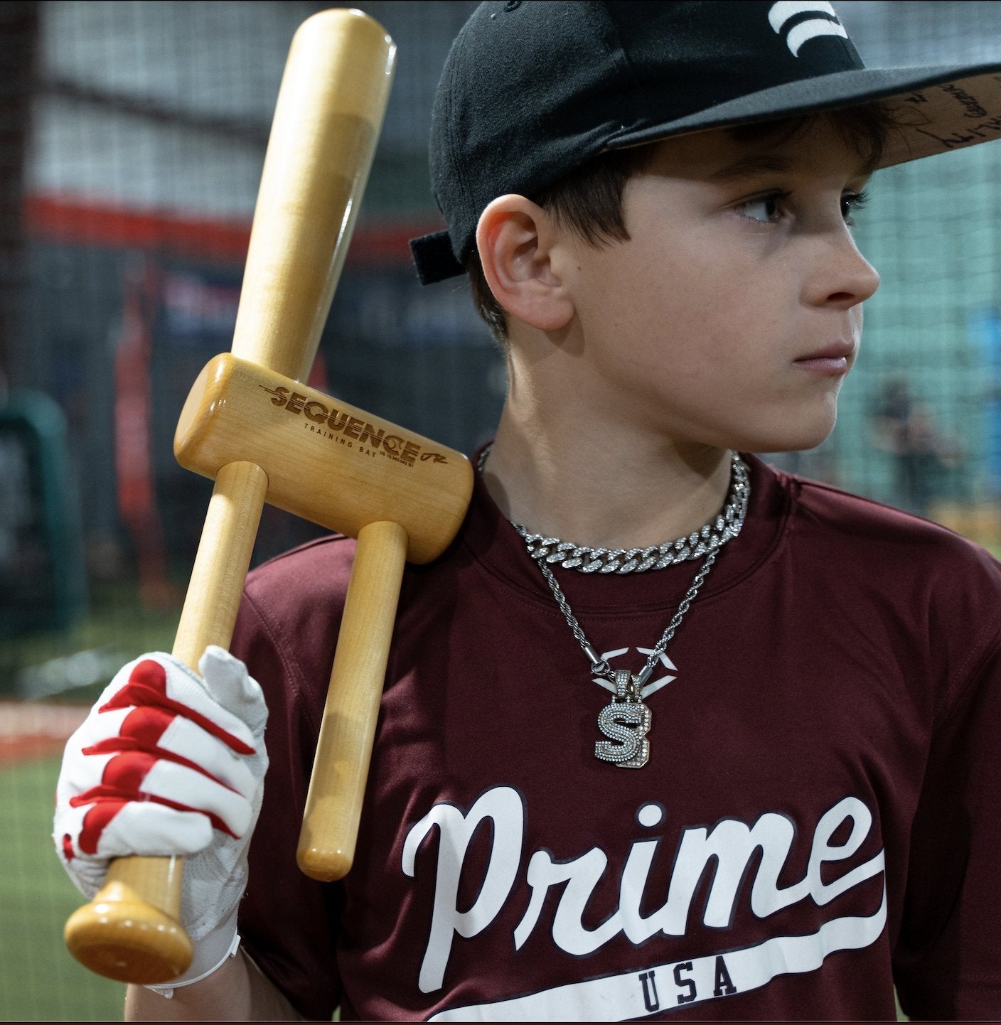 Youth baseball swing trainer designed to enhance bat speed, power, and contact for young hitters.